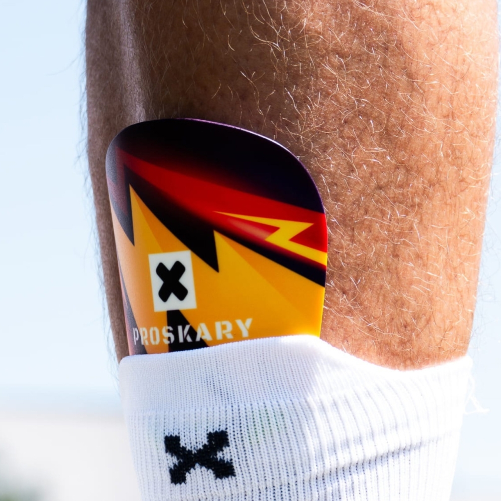 Proskary Comic Shin Pads Football Shin Pads Black-Orange 12x8 cm